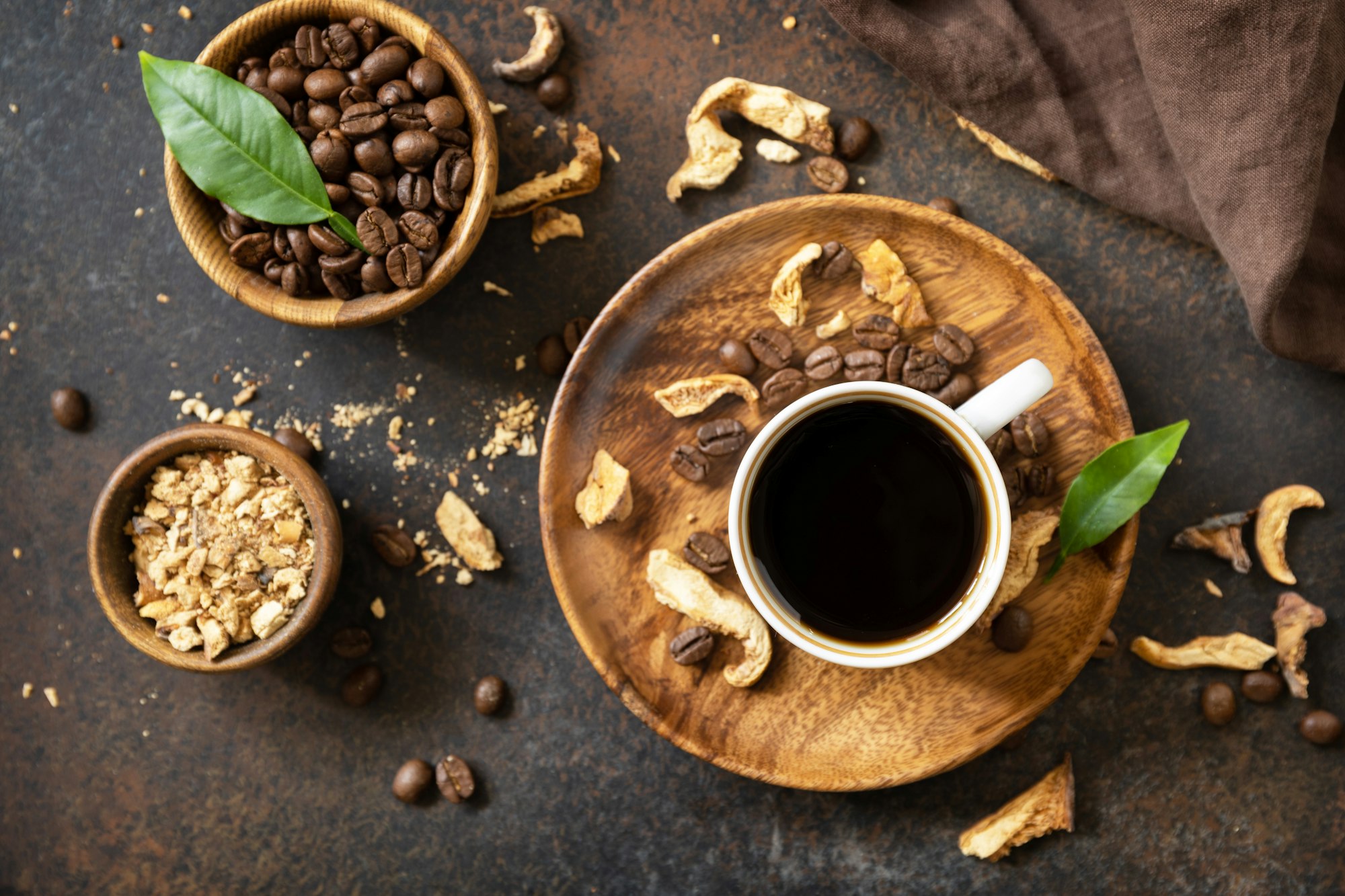 Mushroom coffee in a cup and coffee beans, trendy drink.